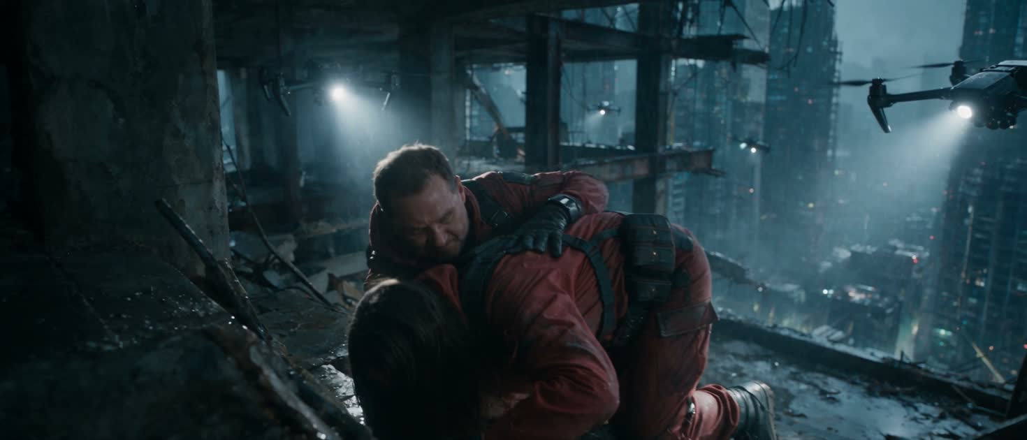 The two protagonists shelter together as a surveillance drone approaches